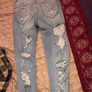 Ripped front and back American eagle jeans